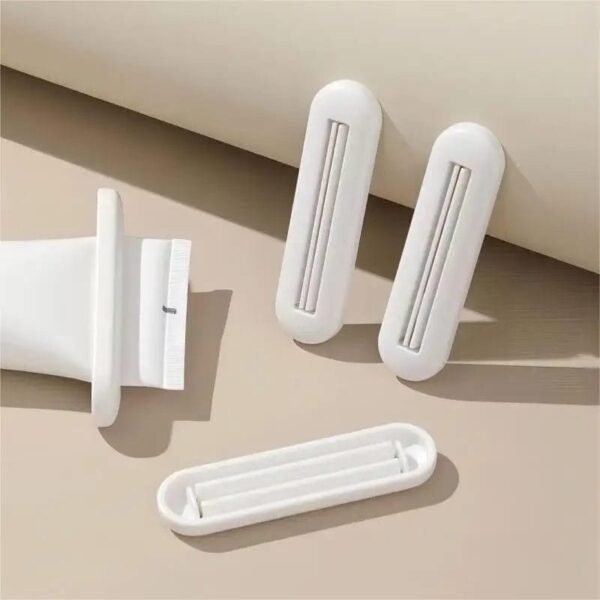 Exprimidor de pasta de dientes, clip de pasta de dientes, exprimidor de crema de manos limpiador facial, exprimidor manual de pasta de dientes para el hogar 1